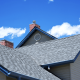 Understanding different types of roofing warranties.